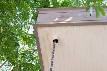 House rain gutter. Rain chains