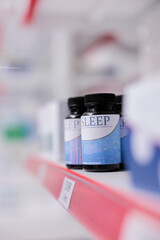 Empty health care facility filled with boxes of supplements and vitamins to help clients with illness. Drugstore shelves filled with packages of medication and drugs, pills and healthcare products.