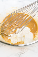 Lemon poppy seed muffins garnished with almond slivers