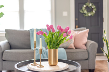 Light and bright living room decorated for spring