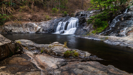 Fototapeta na wymiar Khlong Nam Lai Waterfall, Beautiful waterfalls in klong Lan national park of Thailand