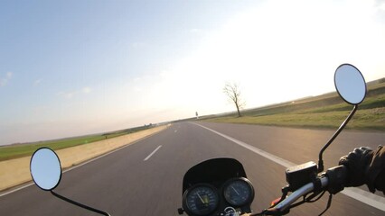 motorbike ride on the highway in first person view on a sunny day