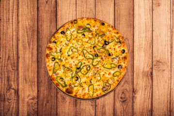 A great pizza with peppers, olives and cheese