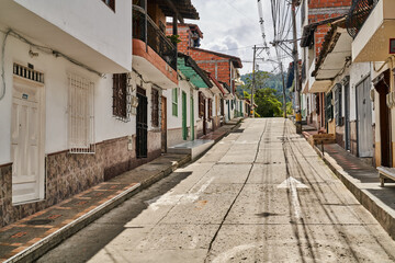 Fototapeta na wymiar Narrow street in the old town Santa Elena Colombia | Medellin Colombia 