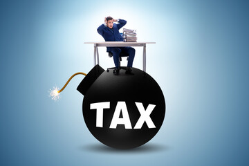 Tax concept with exploding bomb