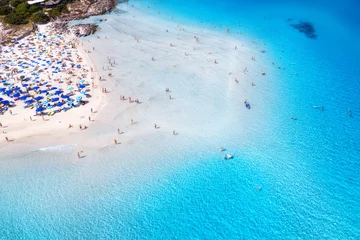 Foto op Plexiglas La Pelosa Strand, Sardinië, Italië Aerial view of amazing sea coast. Top view from drone of beach with white sand, umbrellas, swimming people in blue transparent water at sunny day. Summer in La Pelosa beach, Sardinia, Italy. Tropical