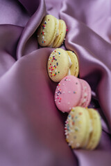 pink and yellow sprinkle macarons