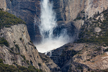 Yosemite NP, CA, USA - March 29, 2022:  Majestic views of granite formations, waterfalls, lakes and streams located within this popular destination.