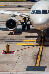 Close-up view of airplane on airfield in airport.