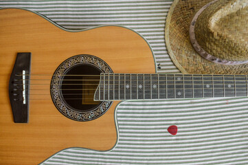 guitar, straw hat and guitar pick
