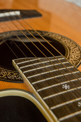 detail of a wooden classical guitar