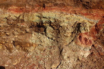 Limestone lying under a layer of variegated clay. Lower section of the Carboniferous period, Kaluga region, Russia