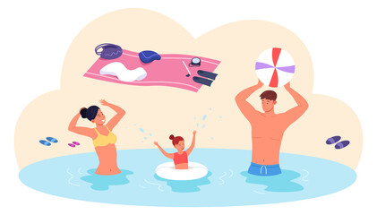 Family together on beach. Summer vacation scene. Parents and kid having fun