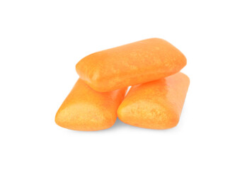 Fototapeta na wymiar Tasty orange chewing gums isolated on white
