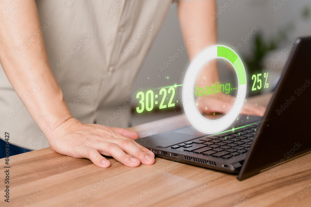 Poster Adult man using a laptop computer for download software and waiting to loading digital business data form website, very slow internet form wifi. Concept of waiting for load of loading symbol.
