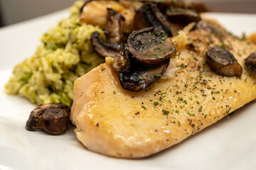 Tilapia served with Broccoli and Cheddar Rice with Mushrooms