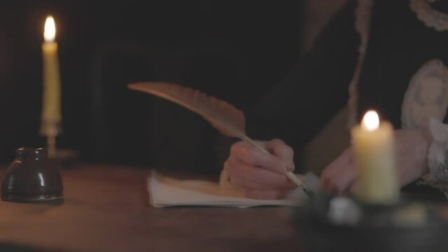 Woman writing with quill pen 1700s