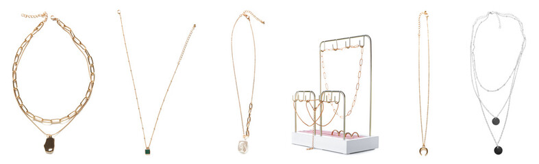 Collection of stylish female jewelry on white background