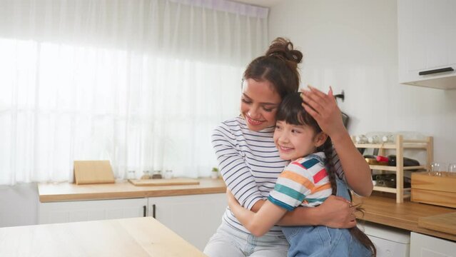 Caucasian happy family, parent spend free time with kid together at home.