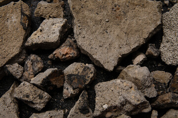 Stone debris on dark background, closeup. Turkey earthquake concept