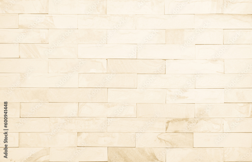 Wall mural cream and white brick wall texture background. brickwork and stonework flooring interior rock old pa