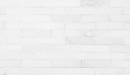 Fototapeta premium Detail of modern white brick wall background photo. White brick wall texture background for stone tile block painted in grey light color wallpaper modern interior and exterior and backdrop design.