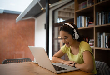 woman having video call meeting at home