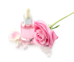 Obraz na płótnie Canvas Bottle of cosmetic oil with rose extract and flower on white background