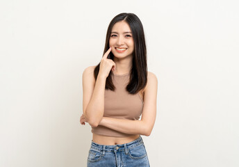 Beautiful smiling happy young asian woman in brown shirt. Charming female lady standing pose thinking on isolated white blank background. Asian cute people looking copy space for text advertise