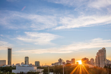 Fototapeta premium Sunset on a pond in the center of the city. Yekaterinburg, Russia