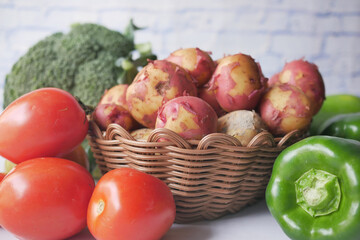 Close up of slice of raw potato in a bowl 