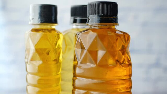 Mustard, olive and sunflower oil in a jar 