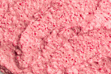 Berry yoghurt ice cream. Smoothies from fresh fruits and berries. Ice cream texture. Delicious sweet dessert close-up as a background.