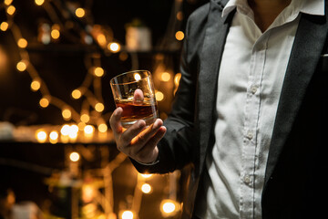 Barman pouring whiskey whiskey glass beautiful night