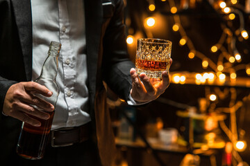 Barman pouring whiskey whiskey glass beautiful night