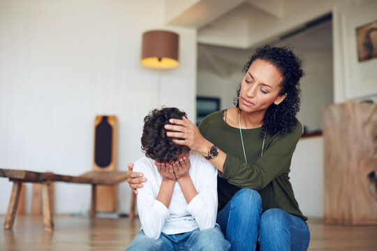 Empathy, sad and family child, mother or woman comfort crying kid over bullying problem, home depression or youth crisis. Mental health, unhappy and mom with support for young son with emotional pain