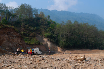 High altitude playground and stadium is being made by cutting tree and levelling Himalayan soil,...