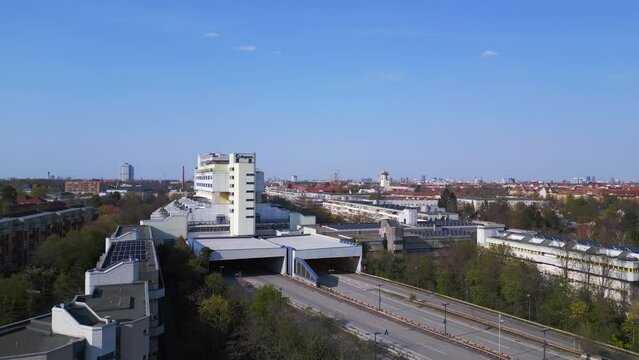 empty freeway goes through tunnel house. Unbelievable aerial top view flight 
highway house in Berlin City district Steglitz Germany spring 2023. descending drone
4k uhd cinematic footage.