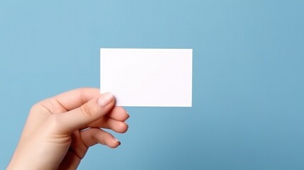 Woman’s hand showing blank business card on blue background. Generative AI.