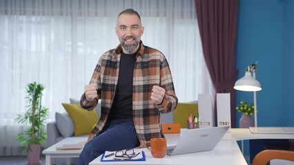 The adult man is positively rejoicing.