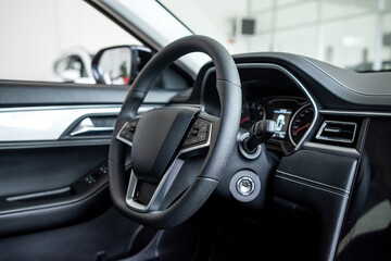 New modern car interior inside in modern showroom