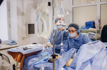 Two women carried out an operation on the veins using the latest technology