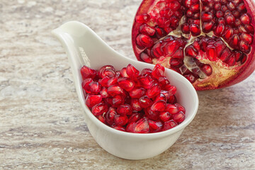 Ripe red Pomegranate seeds in the bowl