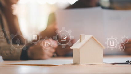 Real estate agents calculate interest rates for clients ,Investment loan approval concepts to build residential homes , real estate business , appraisal of property value ,home loan contract