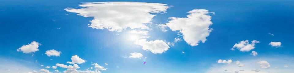 blue sky panorama with puffy clouds, for compositing in 3D graphics and aerial spherical panoramas...