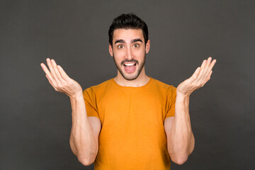 Confident young man in studio portrait.