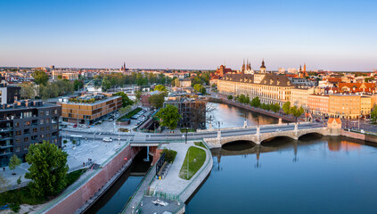 Pomorski bridge and the University in Wroclaw aerial shot at sunset.