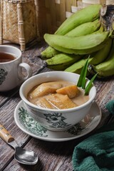 Sweet dessert Malaysia people called Pengat Pisang and Indonesian people called Kolak Pisang Ubi. It is made from banana and coconut milk.