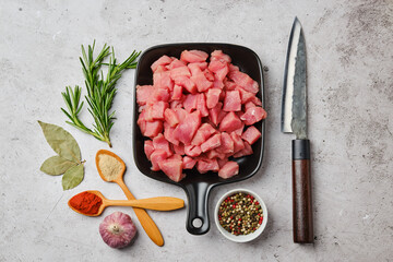 Top view of pork goulash in ceramic pan