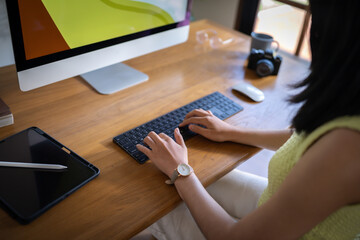 Graphic designer working on digital tablet and computer. Designer Asian Woman artist drawing on graphic tablet  Artist Creative Designer sketch graphic drawing creative